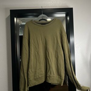 Pharrell’s Williams Green Sweatshirt